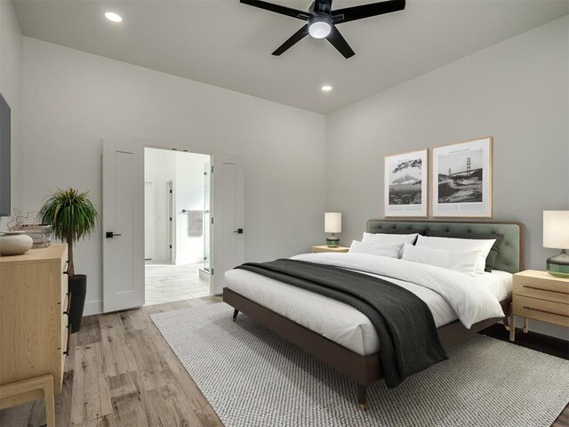 bedroom featuring ceiling fan and light hardwood / wood-style flooring