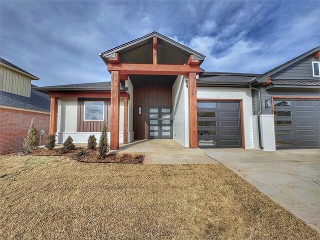 view of front of property with a garage