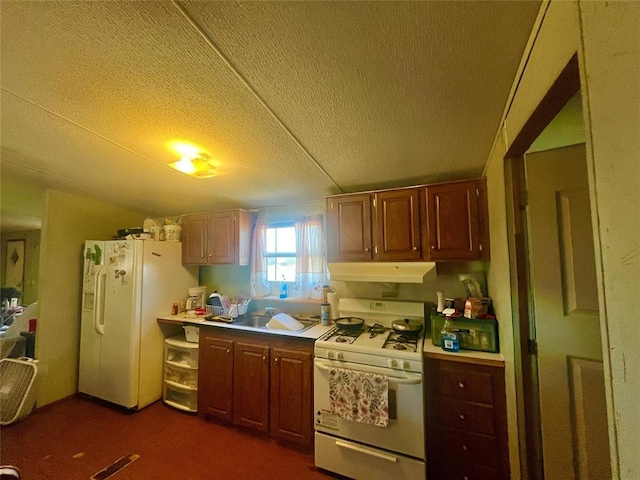 11322 Ns 3500th Rd, Prague, OK 74864 - kitchen featuring white appliances, under cabinet range hood, a textured ceiling, a sink, and light countertops