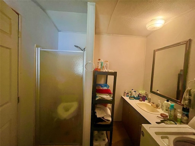 11322 Ns 3500th Rd, Prague, OK 74864 - full bathroom with a shower stall, vanity, and a textured ceiling