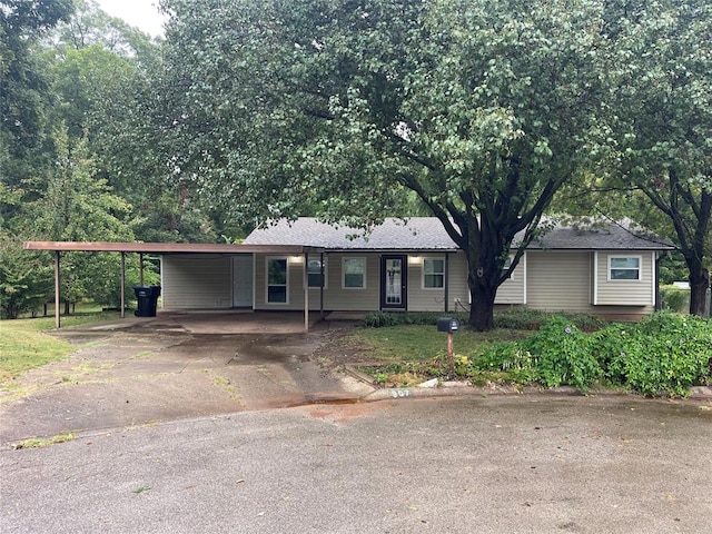 view of front of property with a carport