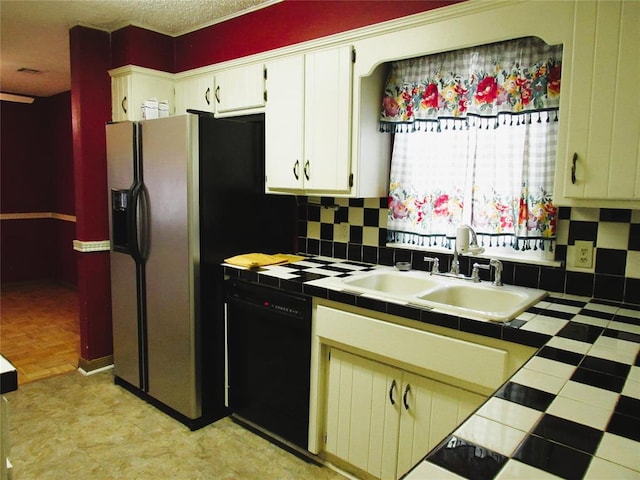 kitchen with dishwasher, tile counters, sink, decorative backsplash, and white cabinets