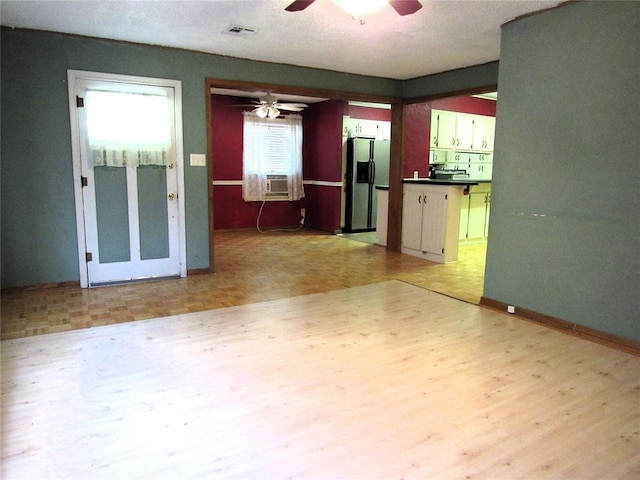 interior space featuring light hardwood / wood-style floors and cooling unit