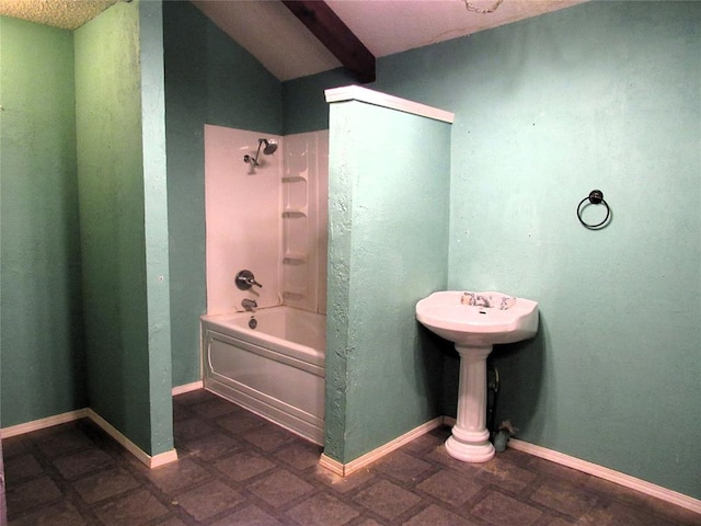 bathroom featuring washtub / shower combination