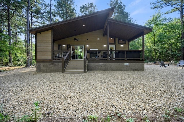 rear view of house featuring ceiling fan