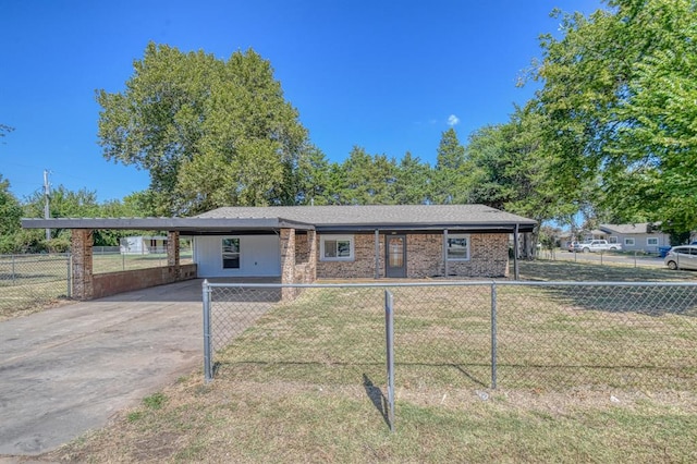 single story home featuring a carport