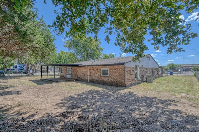 view of home's exterior featuring a patio area