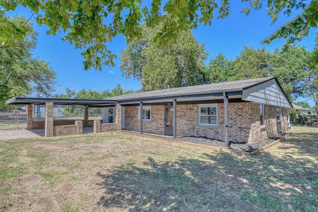 ranch-style house with a front yard