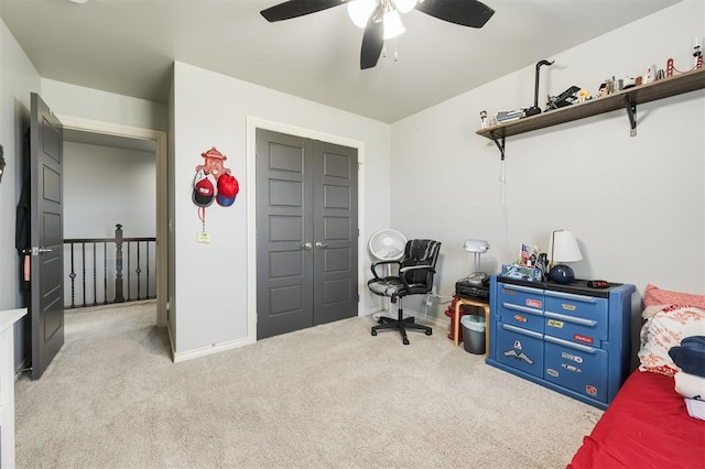 bedroom with light carpet, a closet, and ceiling fan