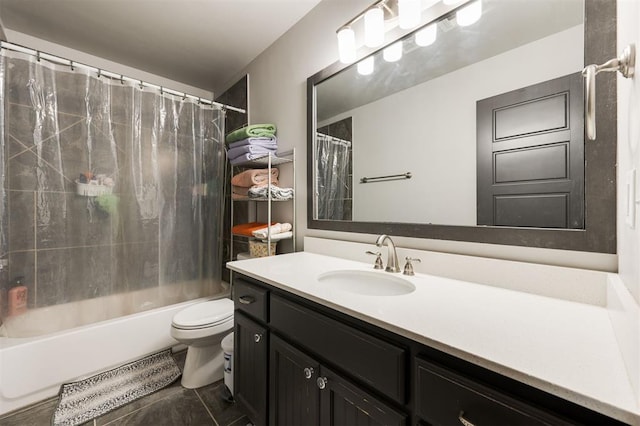 full bathroom with toilet, vanity, tile patterned floors, and shower / bath combo with shower curtain