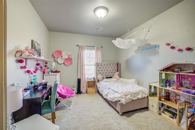 carpeted bedroom featuring visible vents