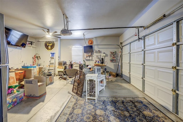 garage featuring ceiling fan and a garage door opener