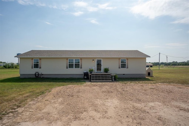 single story home with a front yard