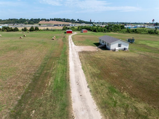 birds eye view of property featuring a rural view