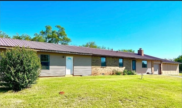 ranch-style home featuring a front yard