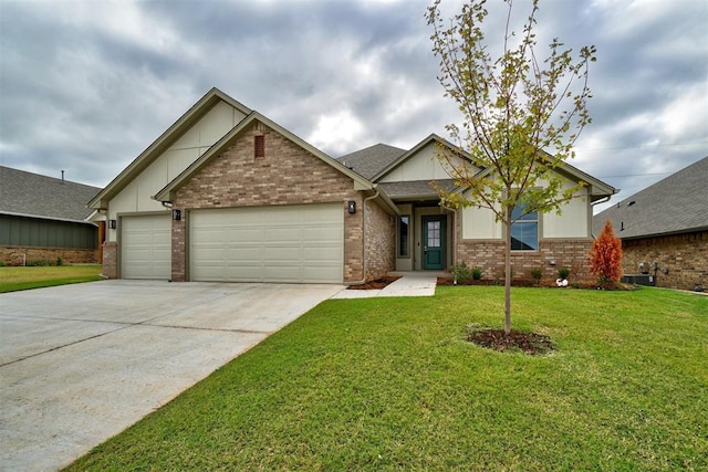 craftsman house with a garage and a front lawn