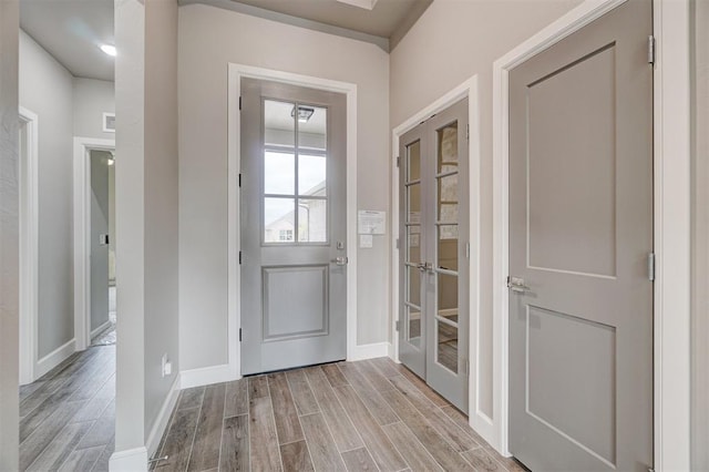 entryway with light hardwood / wood-style flooring