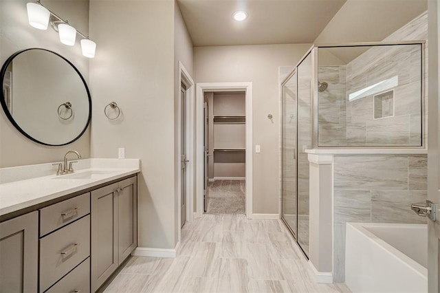 bathroom featuring vanity and plus walk in shower