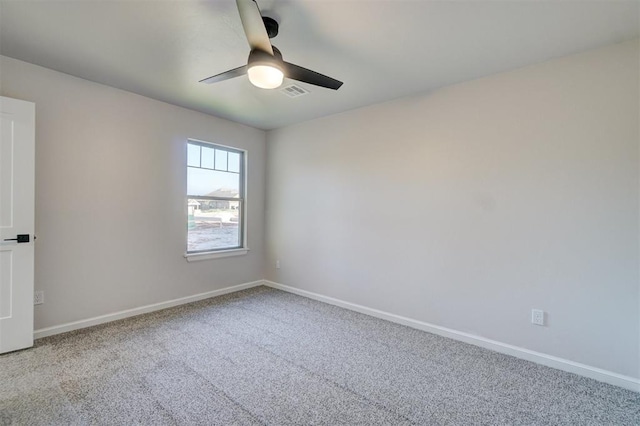 unfurnished room featuring carpet and ceiling fan