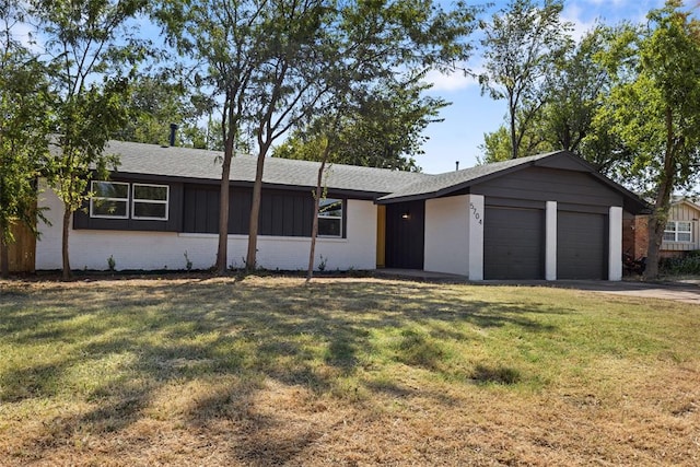 ranch-style home featuring a front yard