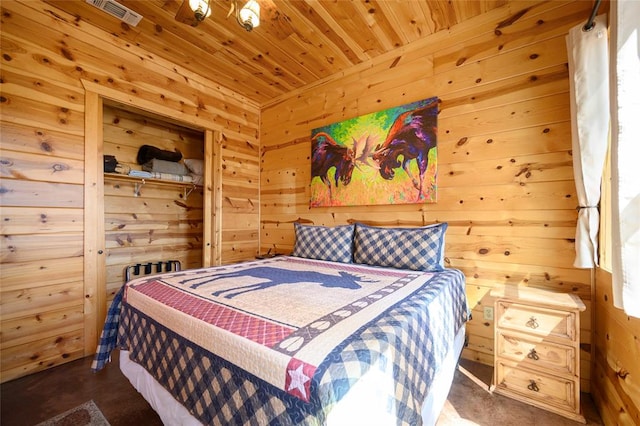 bedroom featuring wood walls and wood ceiling