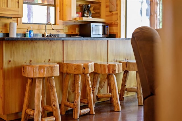 kitchen featuring light brown cabinetry and sink