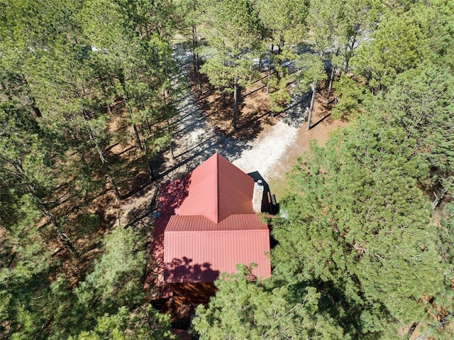 aerial view with a wooded view