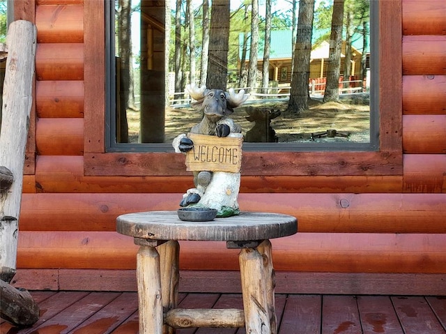 exterior details featuring log veneer siding