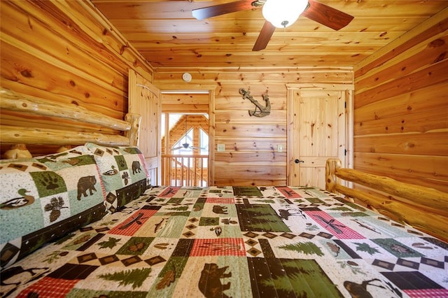 unfurnished bedroom featuring wood ceiling and wooden walls