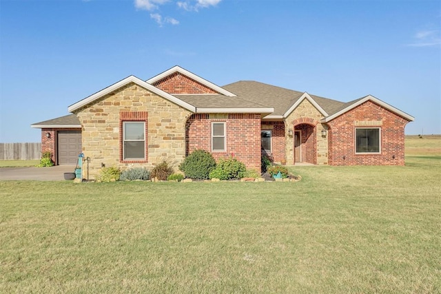 11335 N 1930th Rd, Sayre, OK 73662 - view of front of house featuring a front yard, a shingled roof, brick siding, stone siding, and driveway