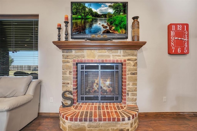 11335 N 1930th Rd, Sayre, OK 73662 - detailed view of a stone fireplace and wood finished floors