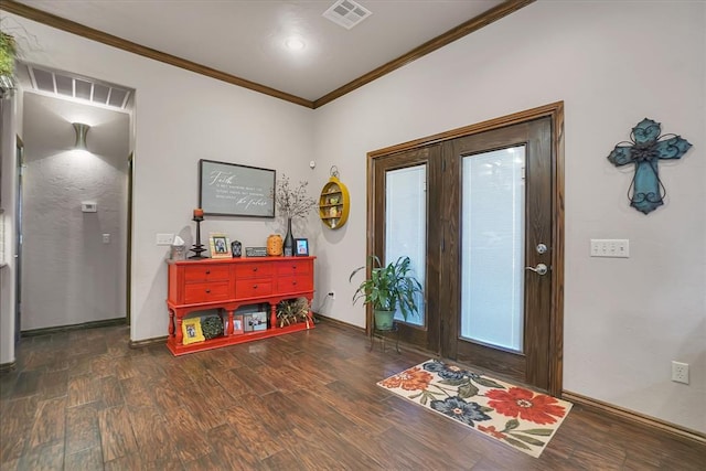 entrance foyer with crown molding and dark wood-type flooring