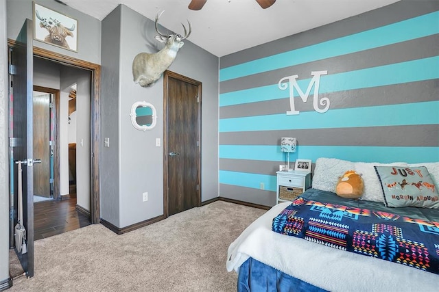 carpeted bedroom featuring ceiling fan