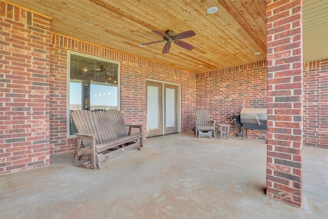 view of patio / terrace with ceiling fan and a grill