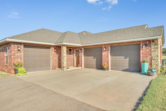 11335 N 1930th Rd, Sayre, OK 73662 - view of front of home with a garage, a shingled roof, and brick siding