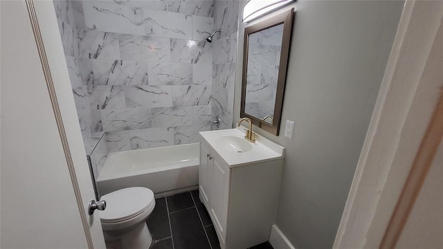 full bathroom with tile patterned flooring, toilet, vanity, and tiled shower / bath