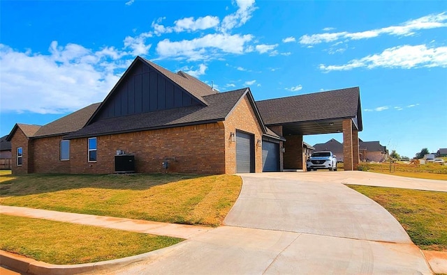 9321 SW 35th St, Oklahoma City, OK 73179 - view of side of property with board and batten siding, a lawn, an attached garage, brick siding, and concrete driveway