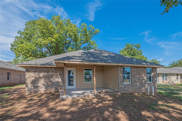 rear view of property with a patio area