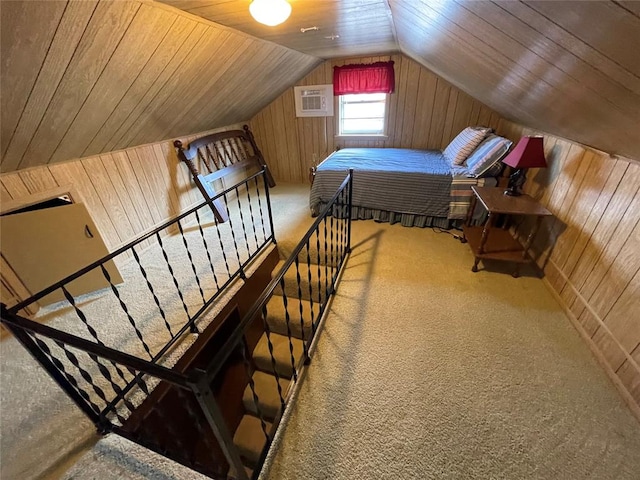 stairway with wood walls, carpet, wooden ceiling, and lofted ceiling