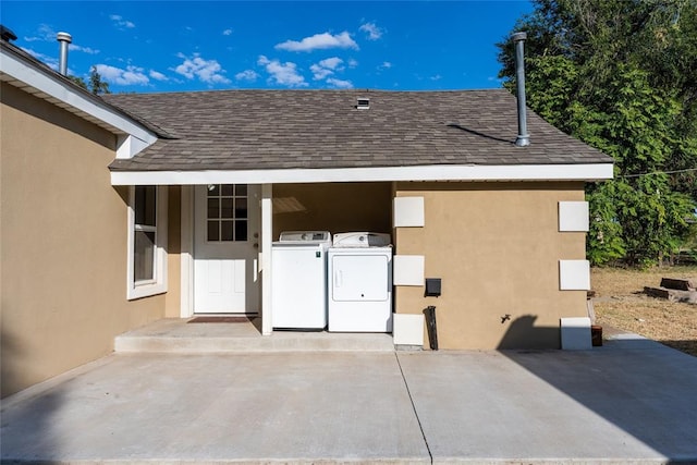 exterior space with washer and dryer and a patio