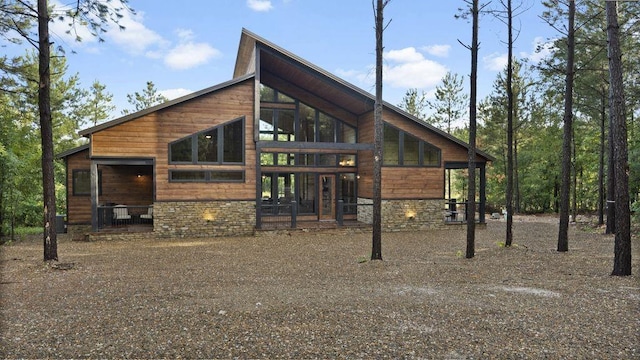 rear view of property featuring french doors