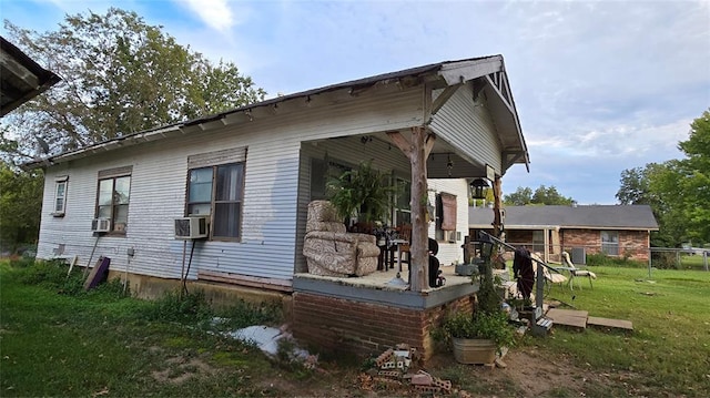 618 S Wewoka Ave, Wewoka, OK 74884 - exterior space with a lawn and cooling unit