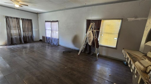618 S Wewoka Ave, Wewoka, OK 74884 - interior space with ceiling fan, ornamental molding, and dark wood-type flooring