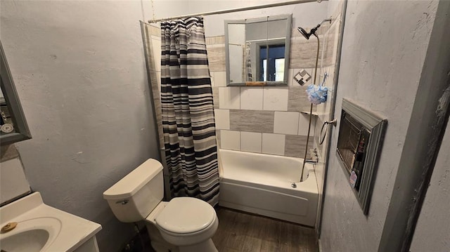 618 S Wewoka Ave, Wewoka, OK 74884 - full bathroom featuring hardwood / wood-style floors, vanity, toilet, and shower / tub combo with curtain