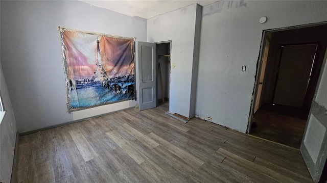 618 S Wewoka Ave, Wewoka, OK 74884 - empty room with wood-type flooring