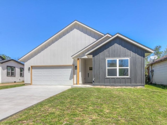 1213 SW 23rd St, Oklahoma City, OK 73109 - ranch-style home with board and batten siding, a garage, concrete driveway, and a front yard