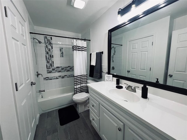 full bathroom with vanity, hardwood / wood-style flooring, toilet, and shower / bathtub combination with curtain