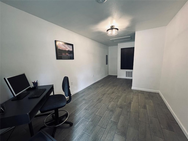 office space featuring dark hardwood / wood-style floors