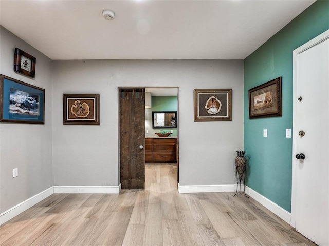 entrance foyer featuring light wood-type flooring