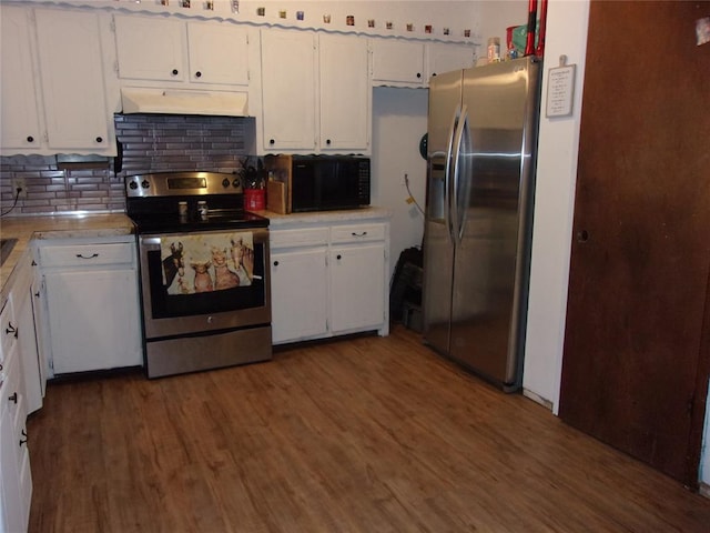 kitchen featuring white cabinets, decorative backsplash, stainless steel appliances, and dark wood-type flooring